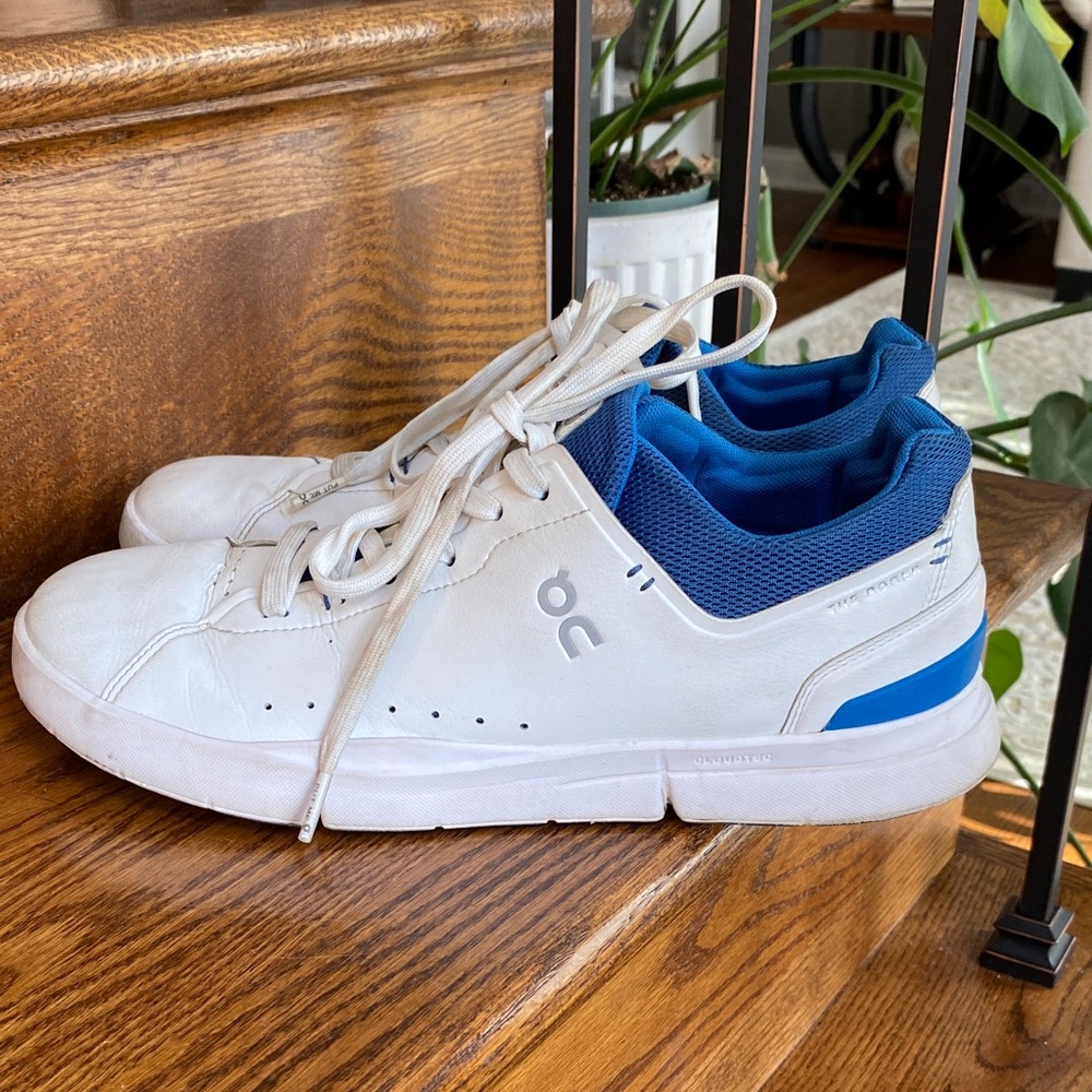 On Running White Sneakers with Blue Collar and Heel Accent